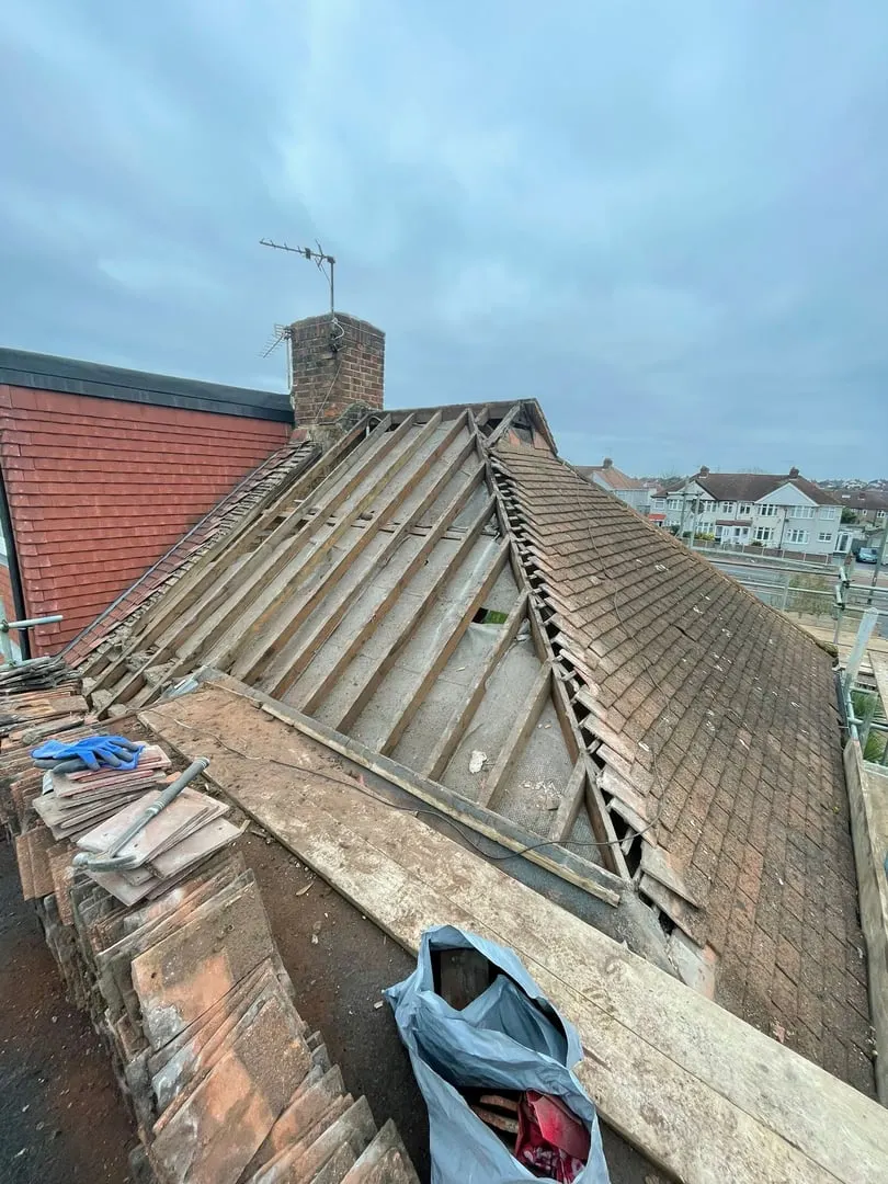 Before: Roof strip and re-tile