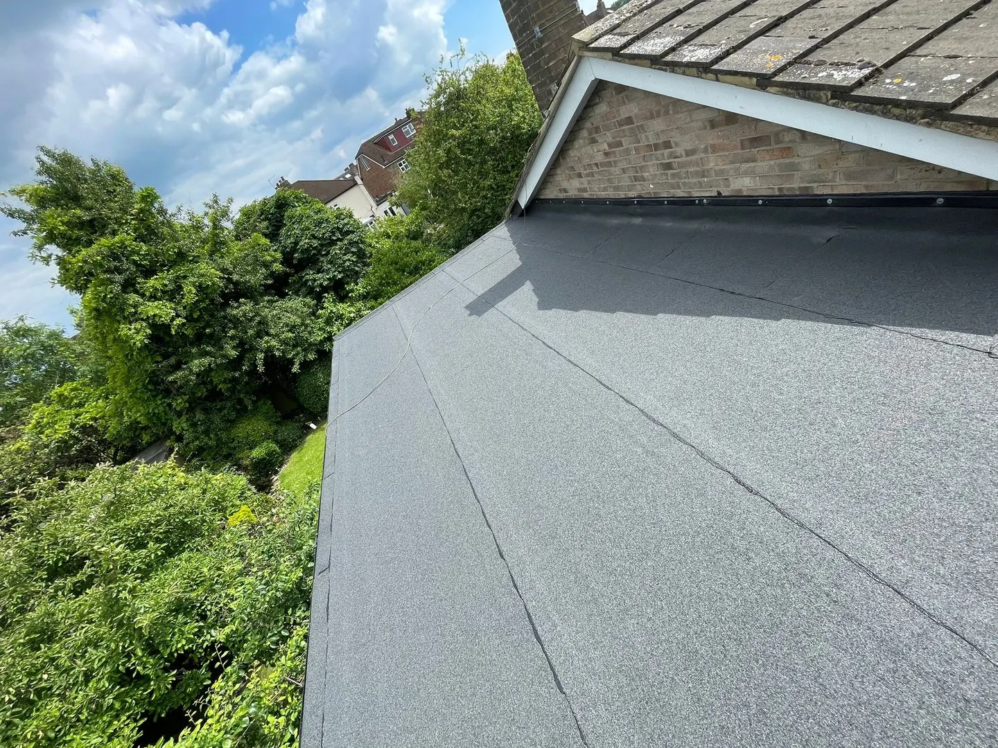 After: Flat roof deck to finished roof