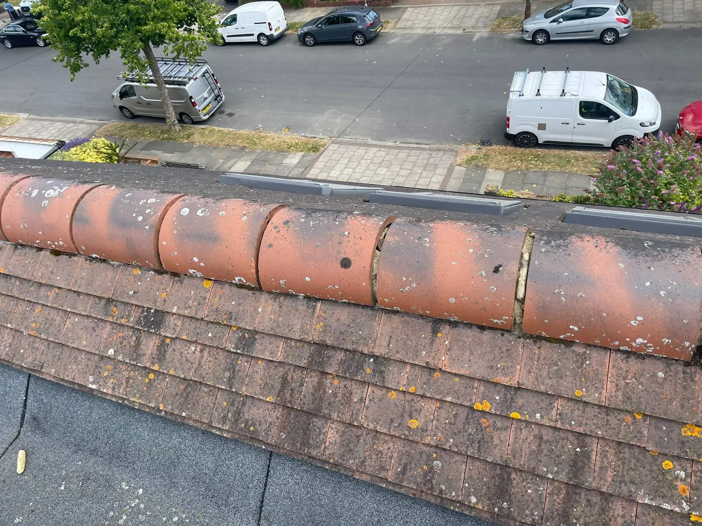 Before: Ridge and flat roof