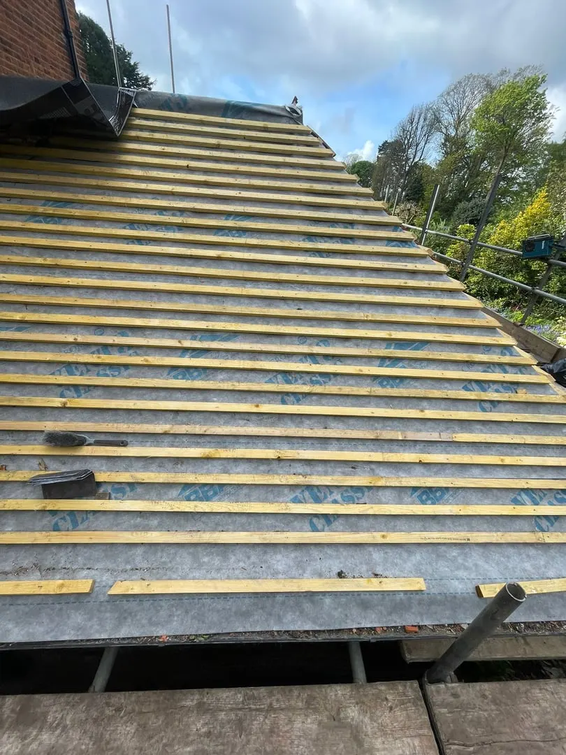 Before: Battens to new tiles