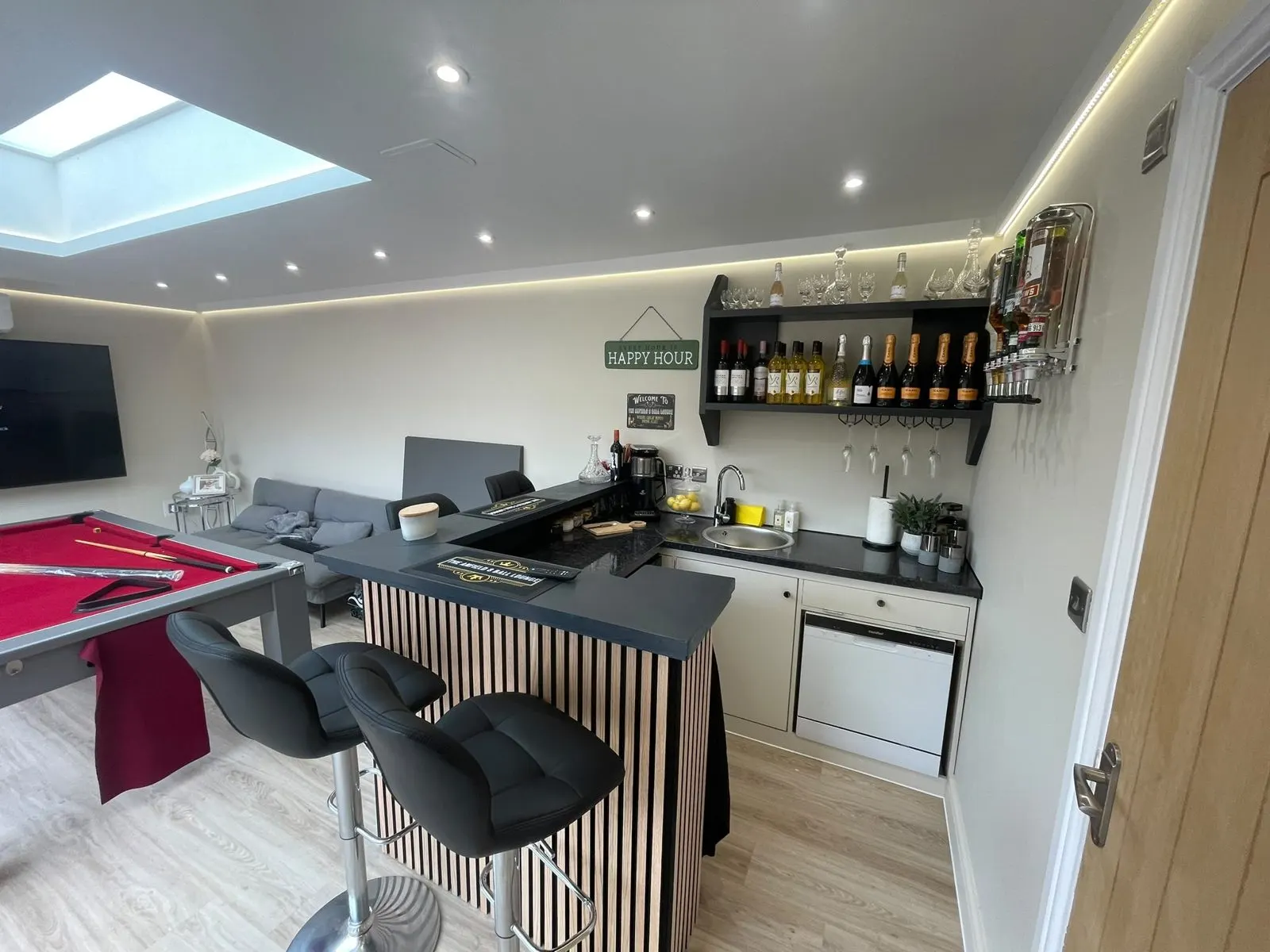 Inside a garden room with a bar and rooflight, G Scott Roofing, roofers and builders covering Tonbridge