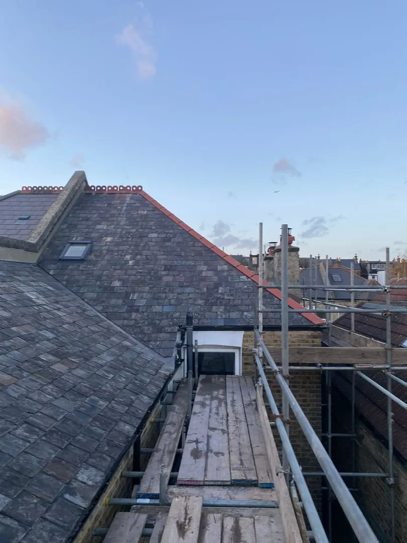 Tiled roof with a scaffold walkway
