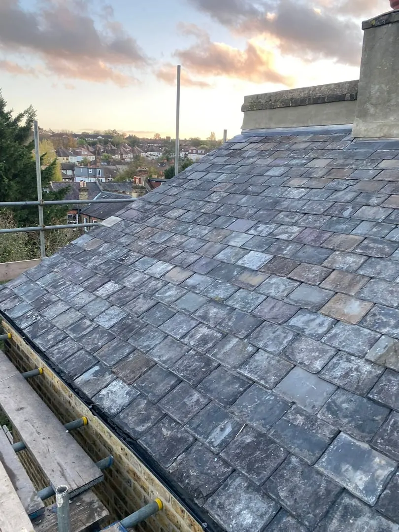 Slate roof with a chimney stack