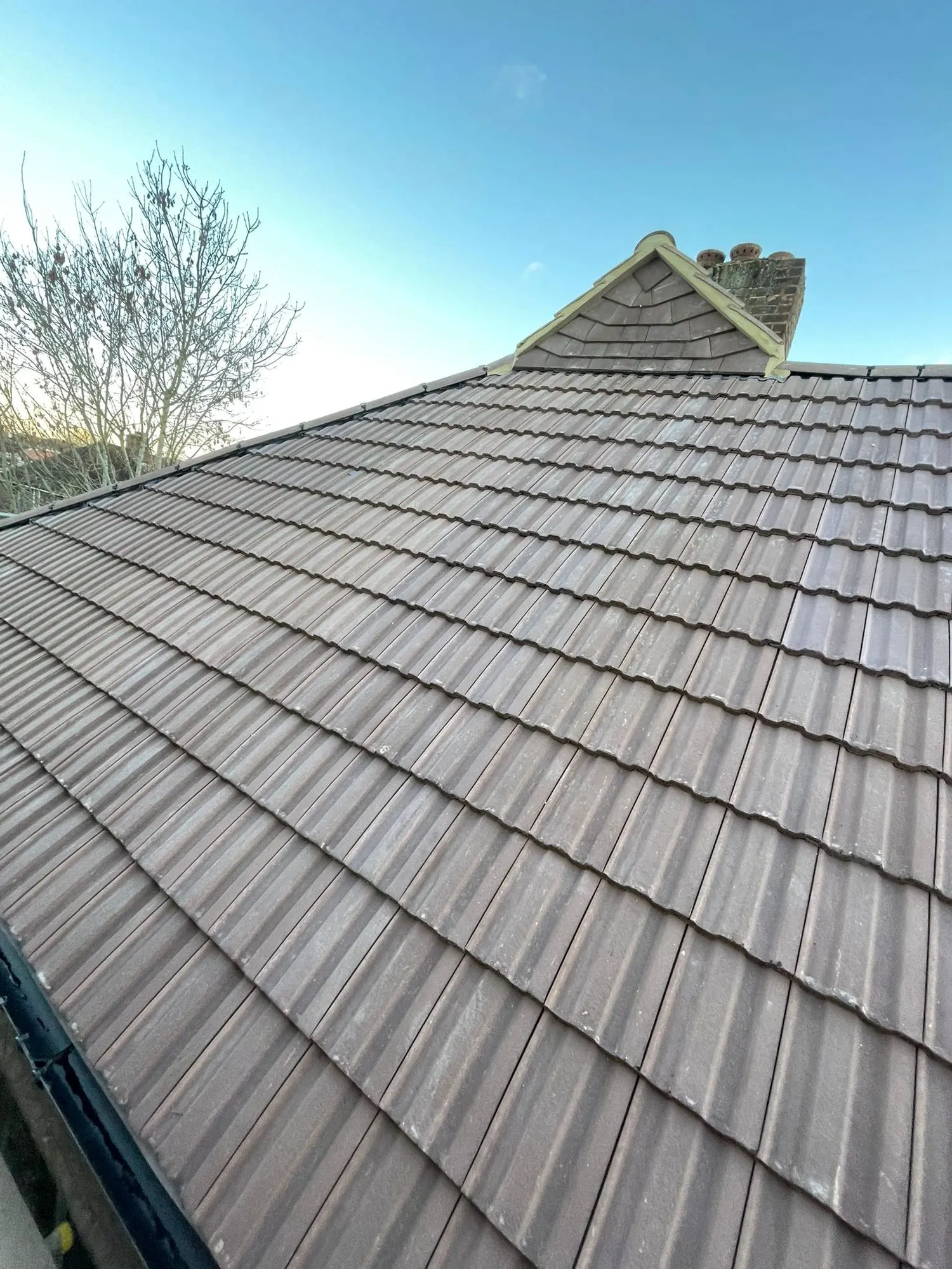 New dark tiled roof