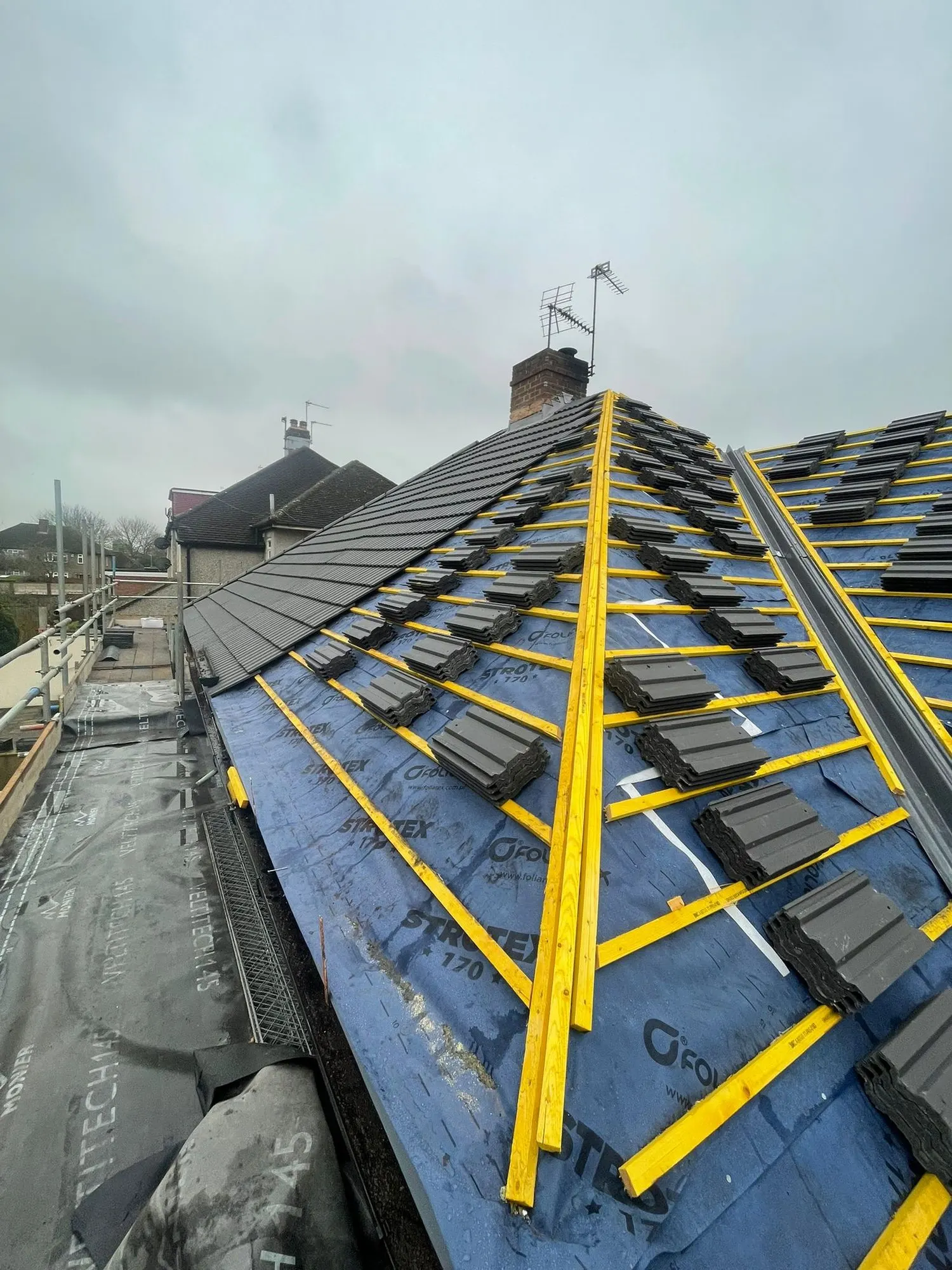 New membrane and battens at the ridge