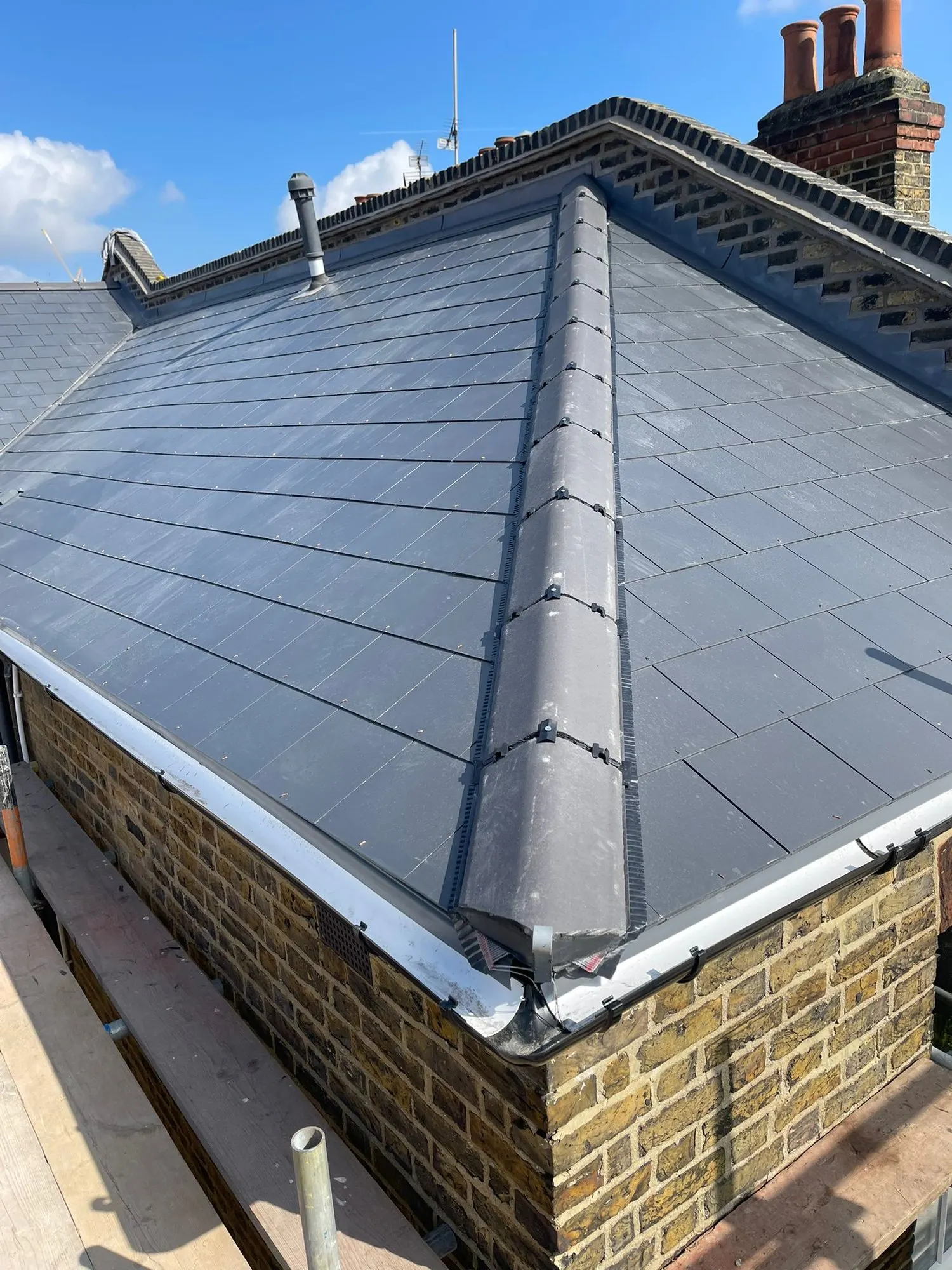 New slate roof with lead hip