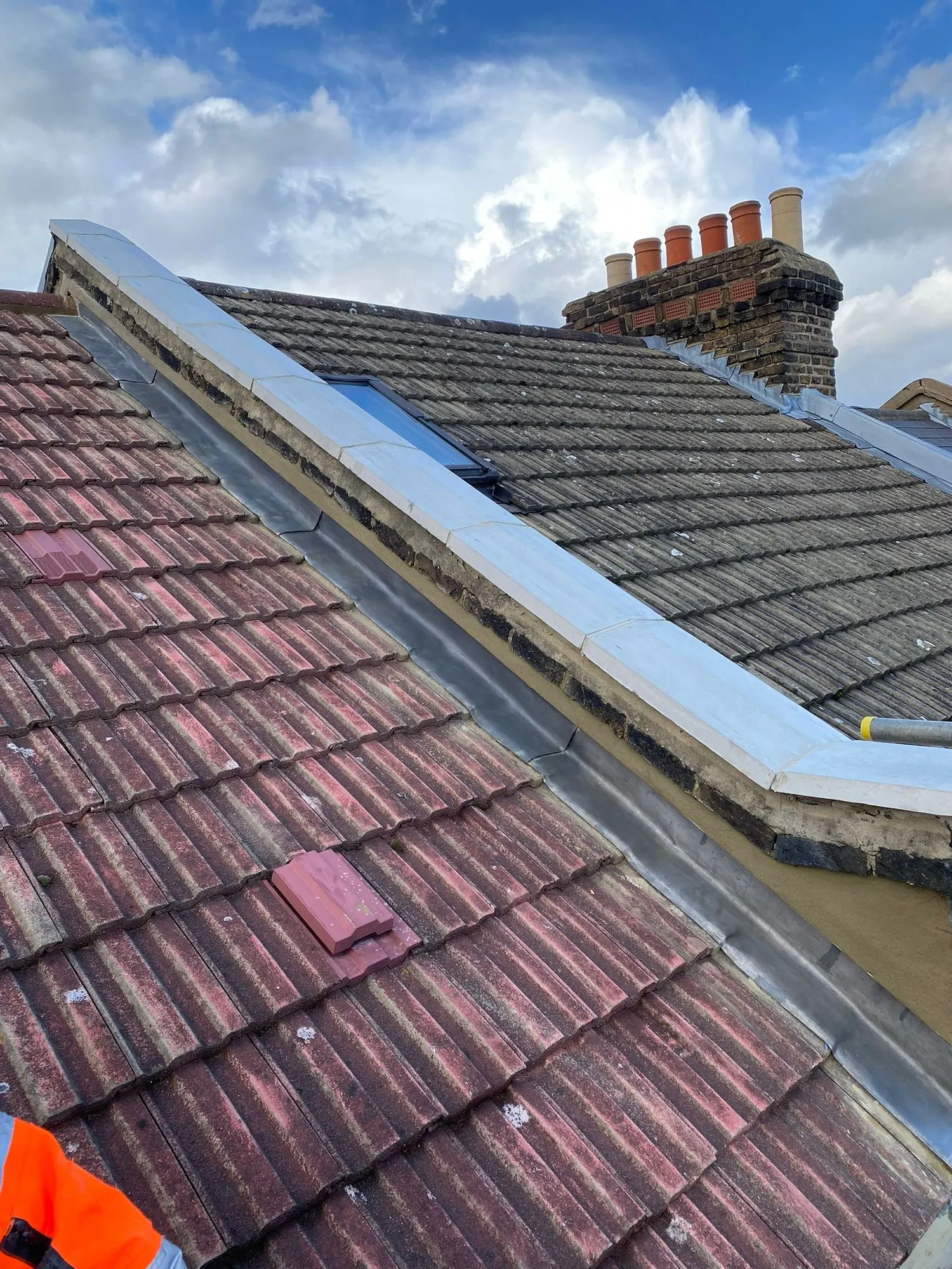 Red clay tiles with lead flashing
