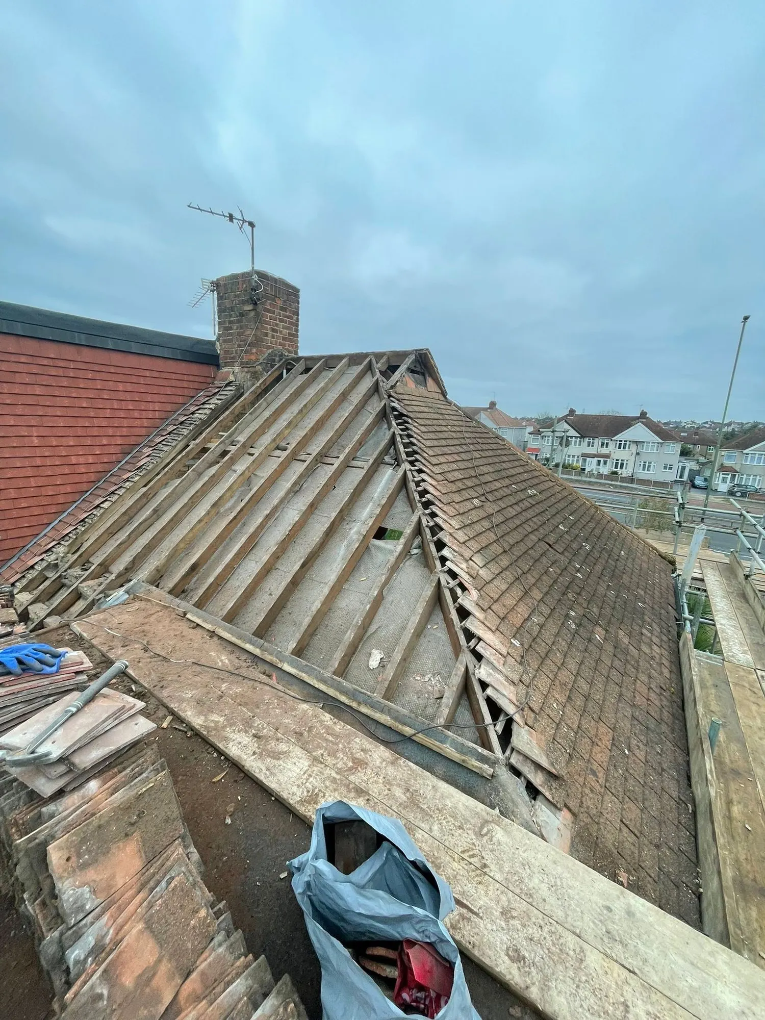 Roof stripped back to the battens