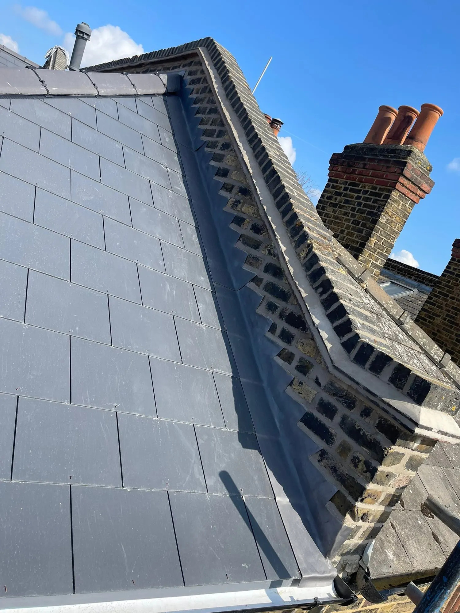 Slate roof beside a chimney