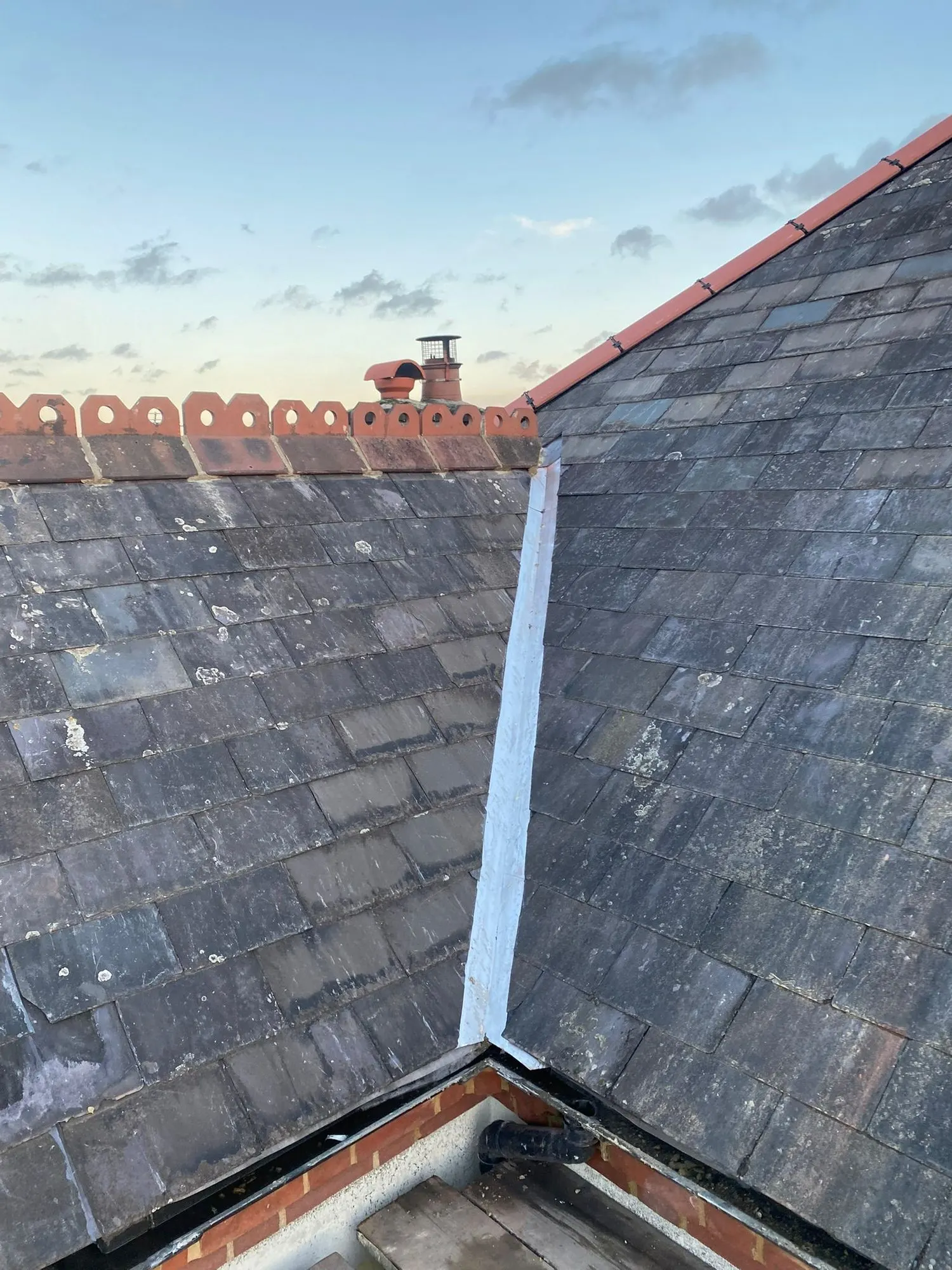 Slate roof with lead valleys
