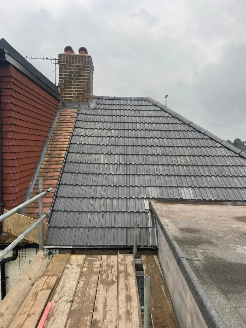 Slate roof ridge and chimney